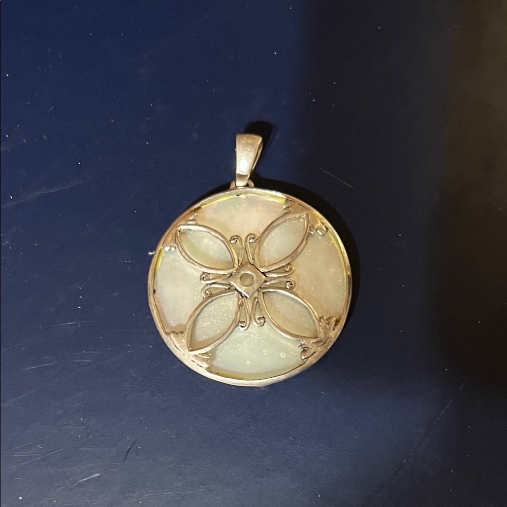 Elegant Silver Pendant with Opalescent Accents